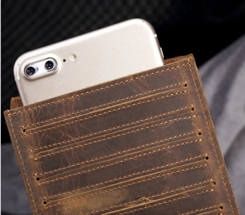 Men's long cowhide leather wallet showing card slots, money pocket, and mobile phone compartment.