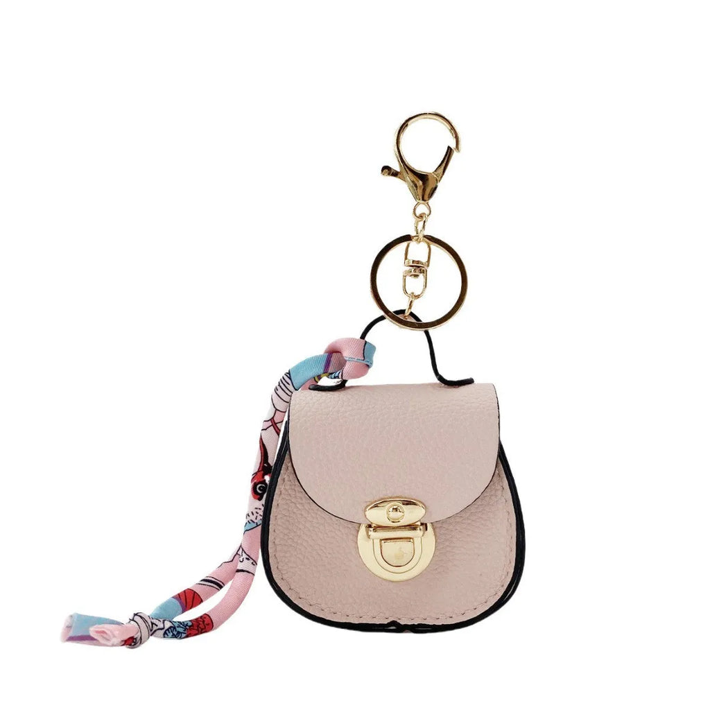 Solid colour PVC coin purse with keychain attachment in multiple colour options