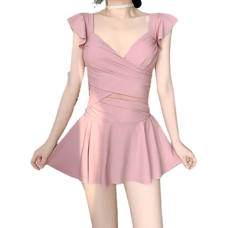 Women's solid colour one-piece French swimsuit in milk silk fabric shown in black, green, and pink.