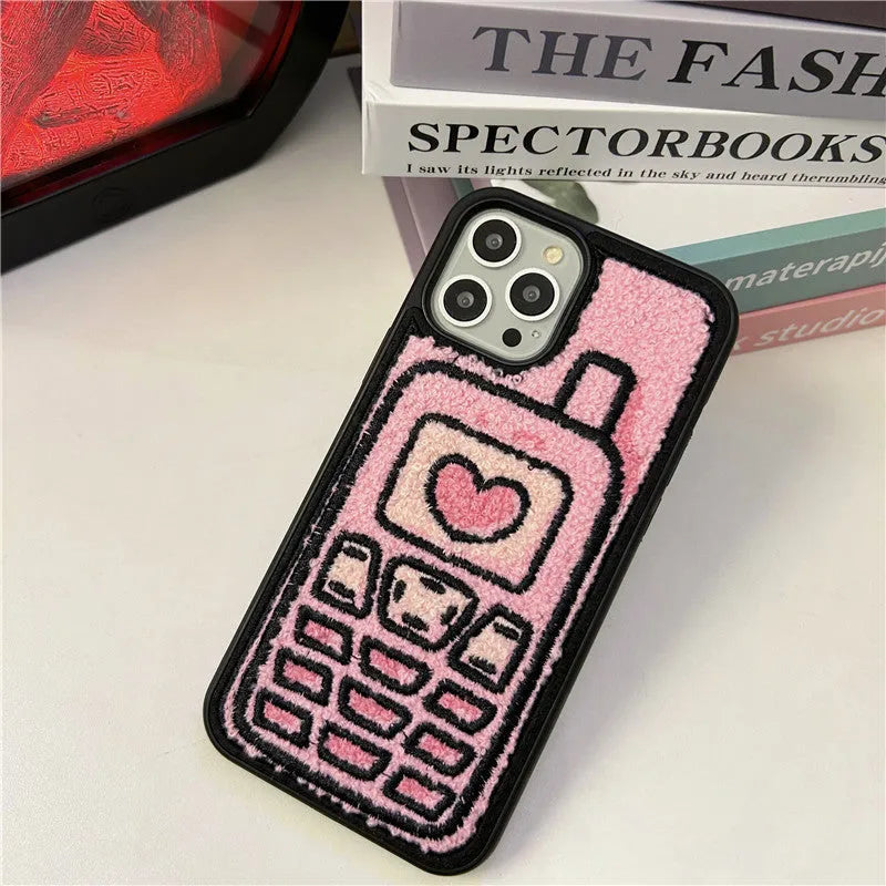 Pink TPU iPhone back cover case with a textured towel embroidery design.