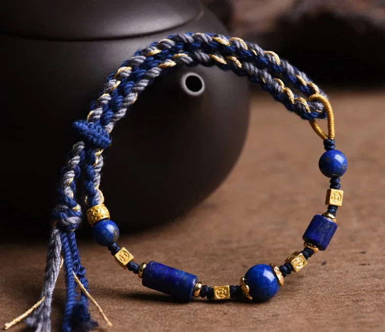 Hand-woven DIY watch band bracelet made from flexible wire in an ethnic lapis lazuli style.