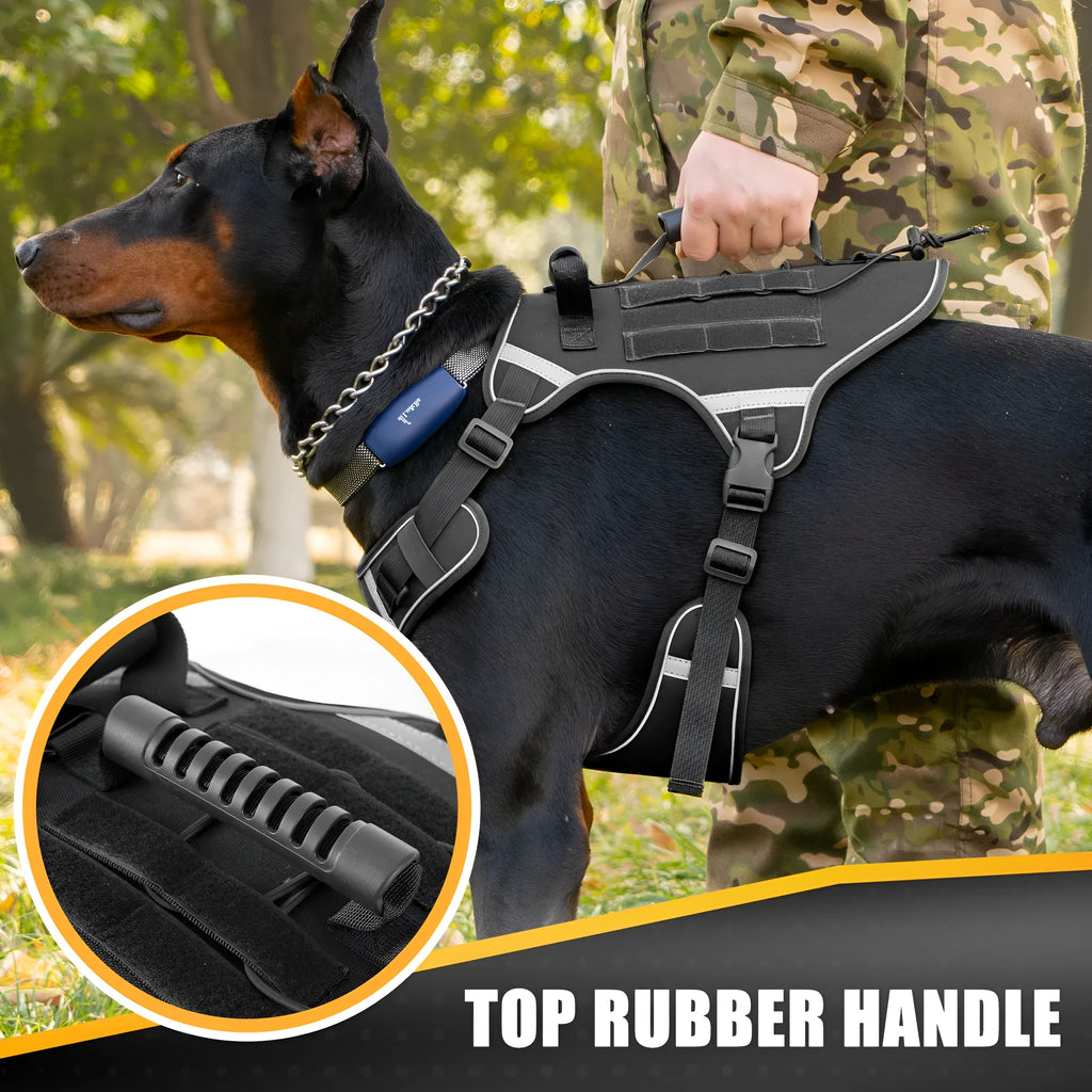 Monochrome tactical dog harness with a back handle and chest strap on a dog.