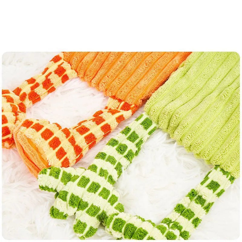 Green or orange plush dog toy with immortal squeaker for aggressive chewers