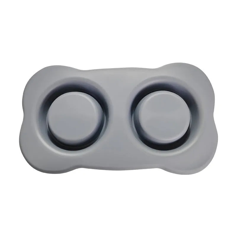Large silicone dog bowl with stainless steel insert in raised feeding design