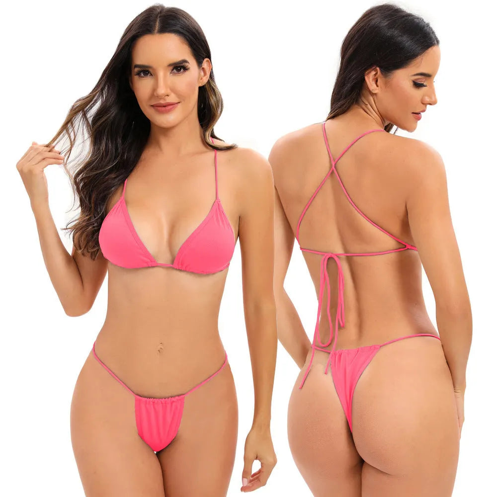 Women's candy coloured cross strap swimsuit with multiple straps and briefs style