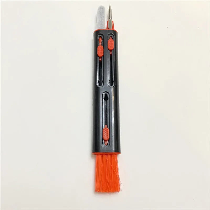 White and red cleaning pen for AirPods Pro with multiple heads including a brush and metal nib.