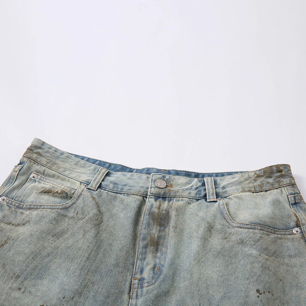 Blue cropped denim middle pants with straight leg design and zipper fly closure on street fashion model