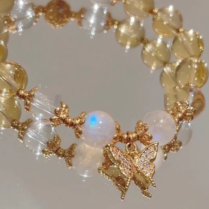 Moonstone white crystal bracelet with diamond-shaped beads and citrine butterfly charm in Chinese style design