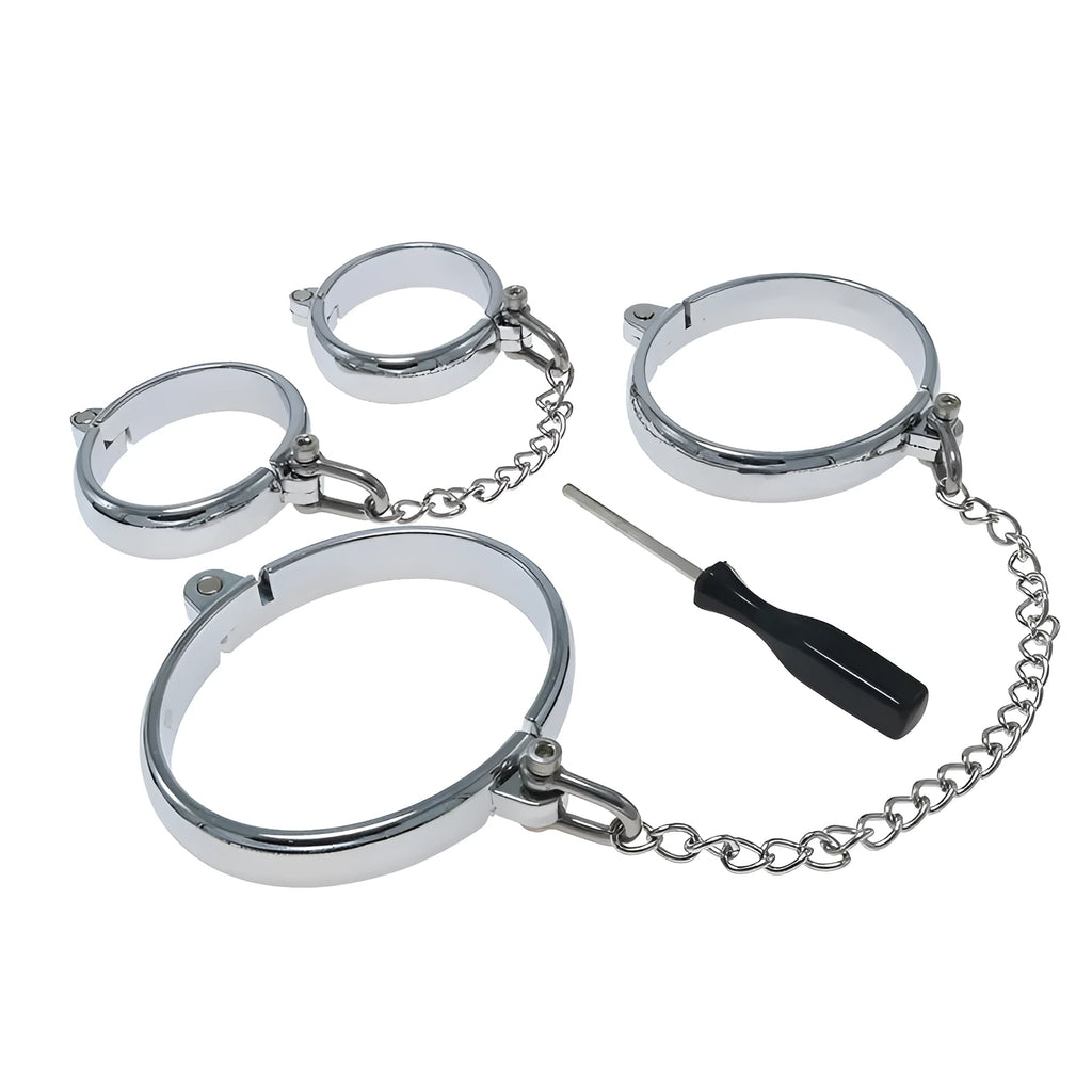 Silver zinc alloy handcuffs and footcuffs set with stainless steel chain linking on black background