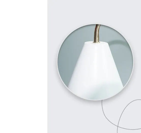 White and log coloured electric candle warmer lamp with dimmer switch on desk