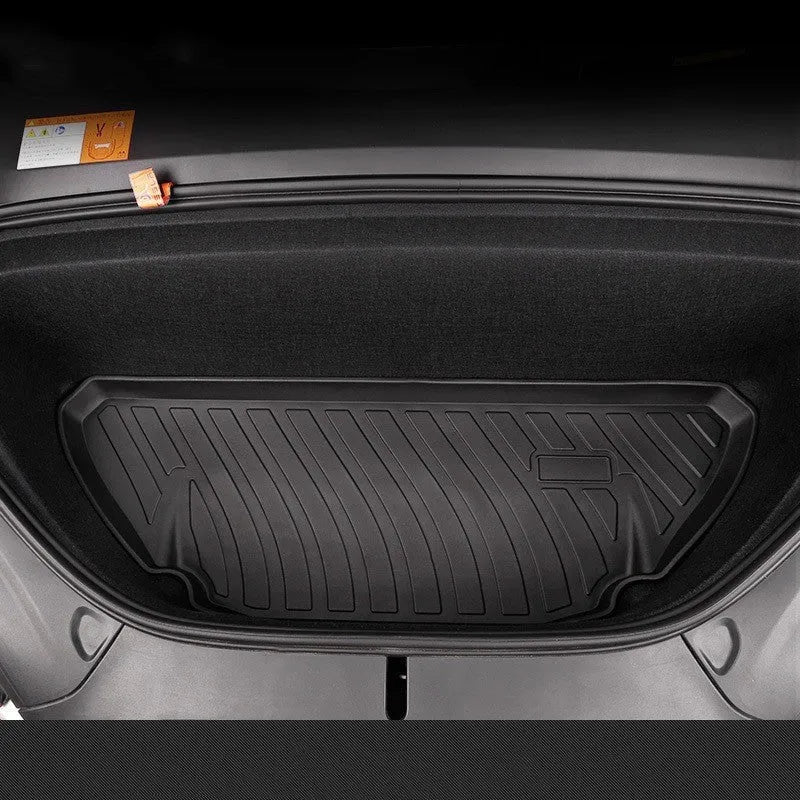 Rubber floor mats for Tesla cars with TPE footrest, custom-fit to Model 3, Y, S, X interiors, showing non-slip backing and textured surface