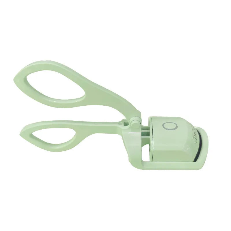 Pink and white USB rechargeable heated eyelash curler with temperature control buttons.