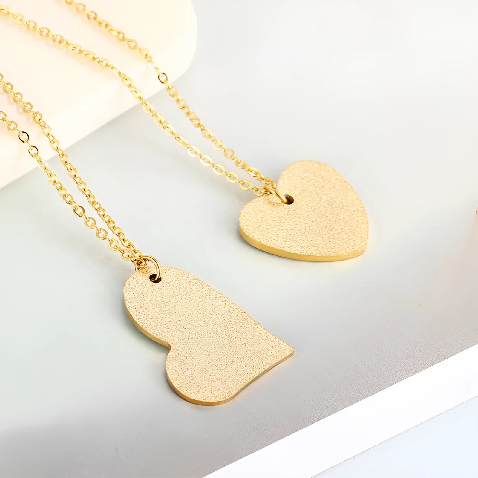Women's silver titanium steel necklace with a geometric heart pendant