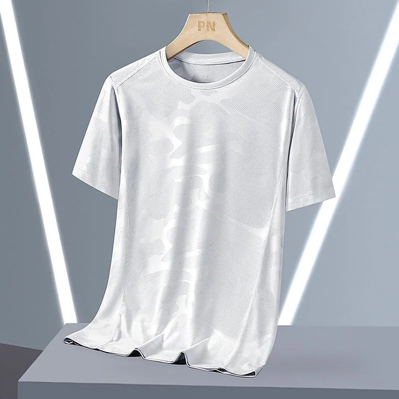 Men's loose fit camouflage short sleeve summer top in quick-drying nylon fabric.