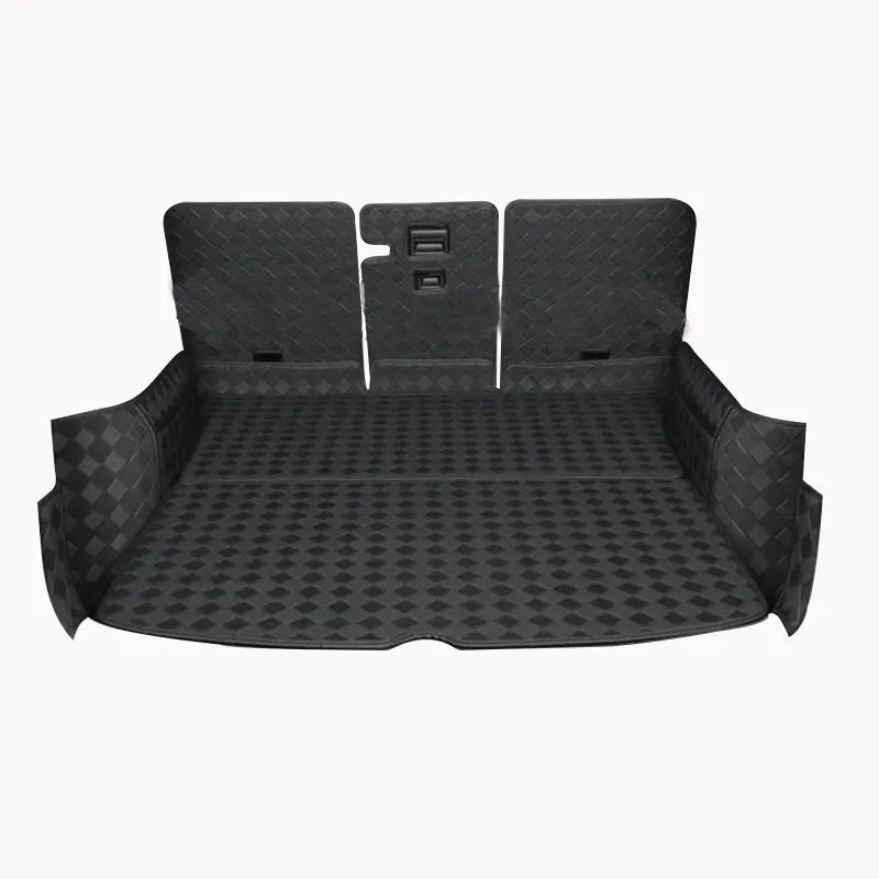 Leather trunk mat for Tesla Model 3 and Model Y in black, shown in car boot.