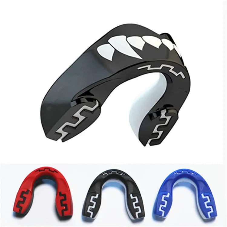 Adult boxing mouthguard with tooth socket design in black/white colour variant showing printed teeth pattern