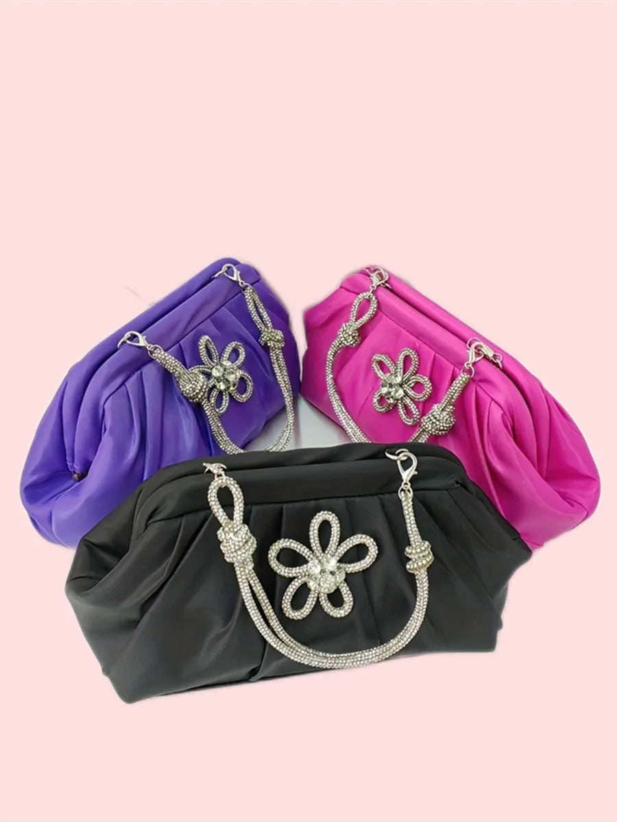 Women's black shoulder messenger bag with document compartment, soft polyester material, and chain decorative details