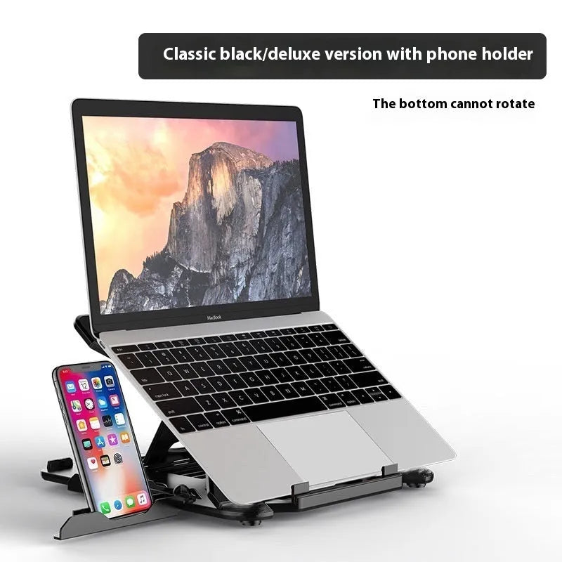 Black ABS plastic laptop cooling stand with slatted platform and adjustable tilt on a wooden desk.