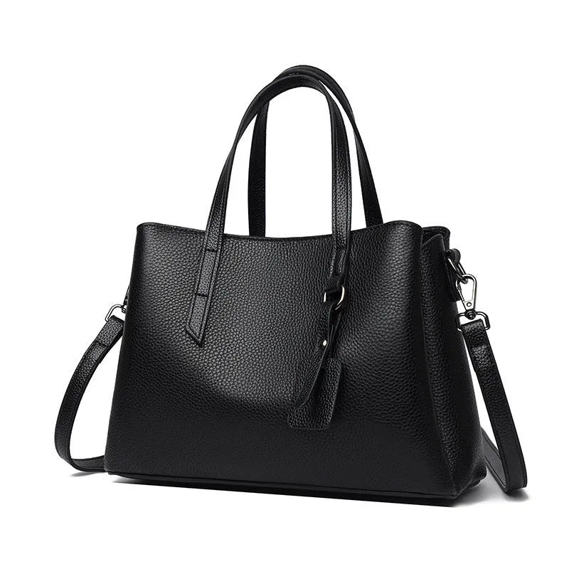 Women's cowhide leather shoulder handbag in horizontal square shape with contrast colour details and single strap