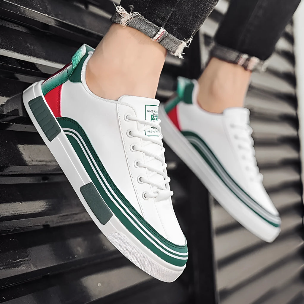 Men's beige, white and green canvas casual shoes with mesh panels, flat heel, and round toe.