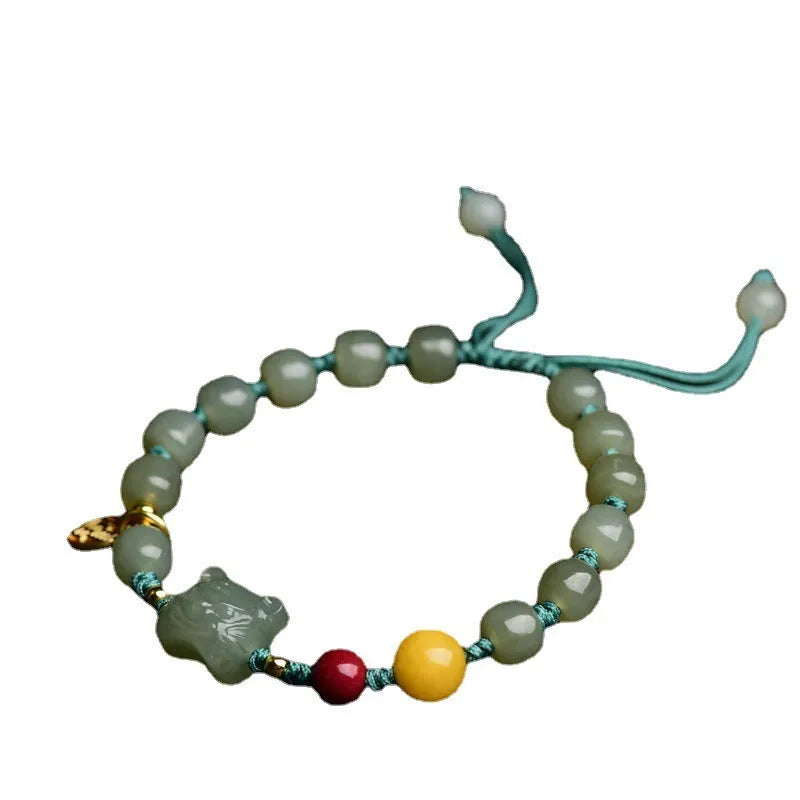 Natural Hetian Jade bracelet with animal Zodiac modelling and unset Cinnabar Beeswax beads.