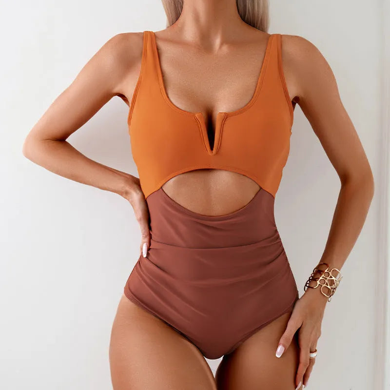 Women's contrast colour one-piece swimsuit in nylon fabric showing colour options