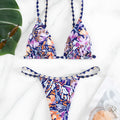 Women's floral print triangle bikini with tie-back and split-front polyester briefs.