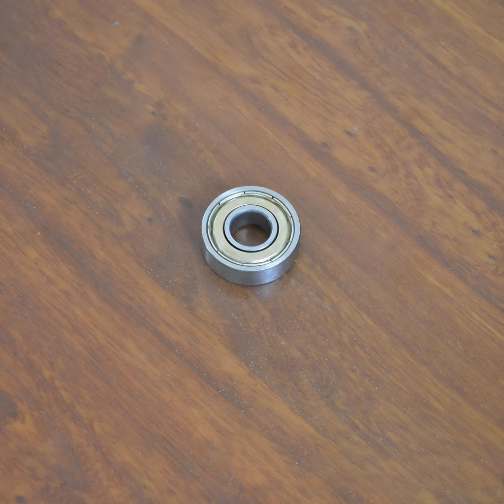 6000zz carbon steel radial ball bearing with 10mm bore, 26mm outer diameter, and steel retainer.