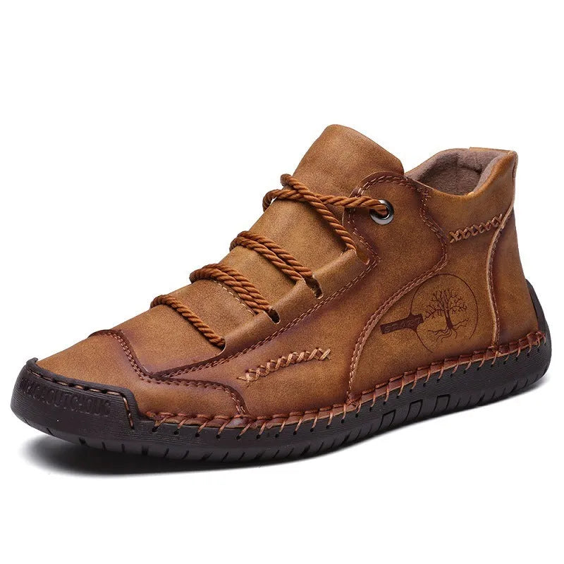 Men's leather mid-top work boots in various colours with lace-up front and rubber sole