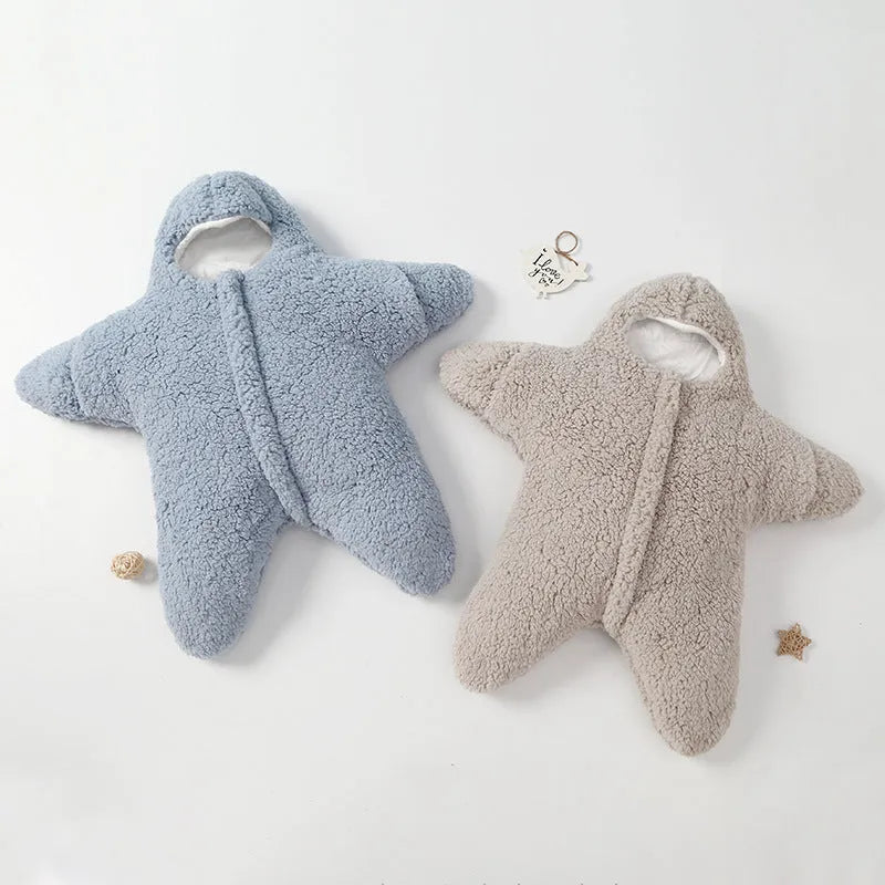 Hooded baby sleeping bag in cashmere cotton fabric with zip opening and hand cuffs