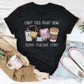 Black straight-cut cotton t-shirt with round neck and short sleeves showing loose fit