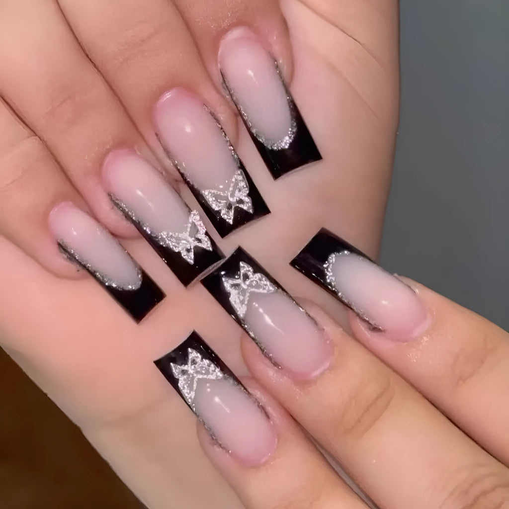 Black French style nail wear armor with glittering butterfly pattern, shown in yellow and black jelly glue colour options.