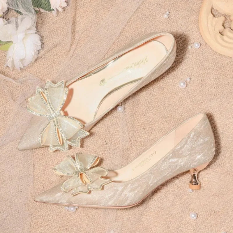 Sequined champagne crystal stiletto heels with pointed toe and rubber sole, available in multiple heel heights