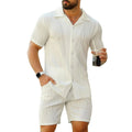 Men's black wave pattern short sleeve shorts suit laid flat showing shirt and matching shorts
