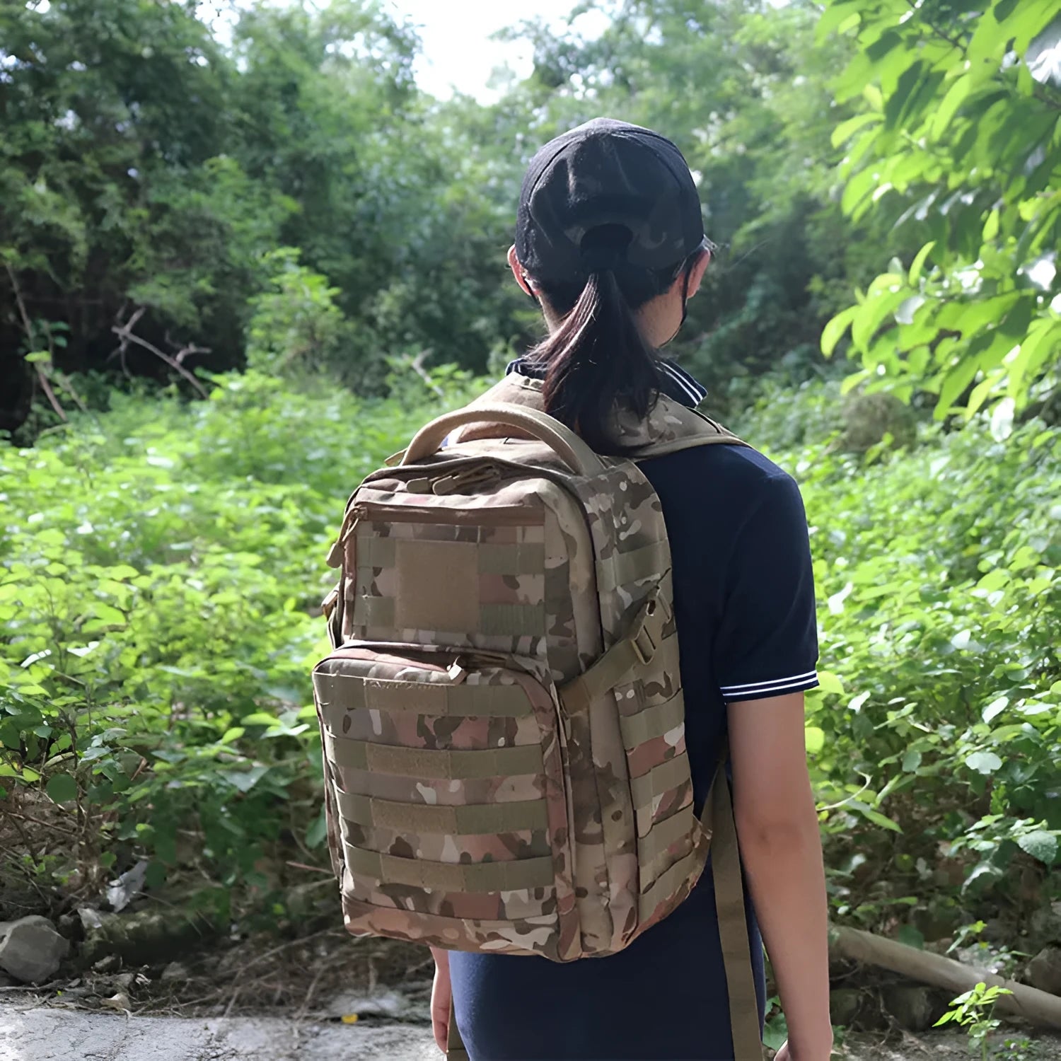 Military tactical assault backpack in outdoor setting showing black, green, khaki, green ruins and CP camouflage colour options