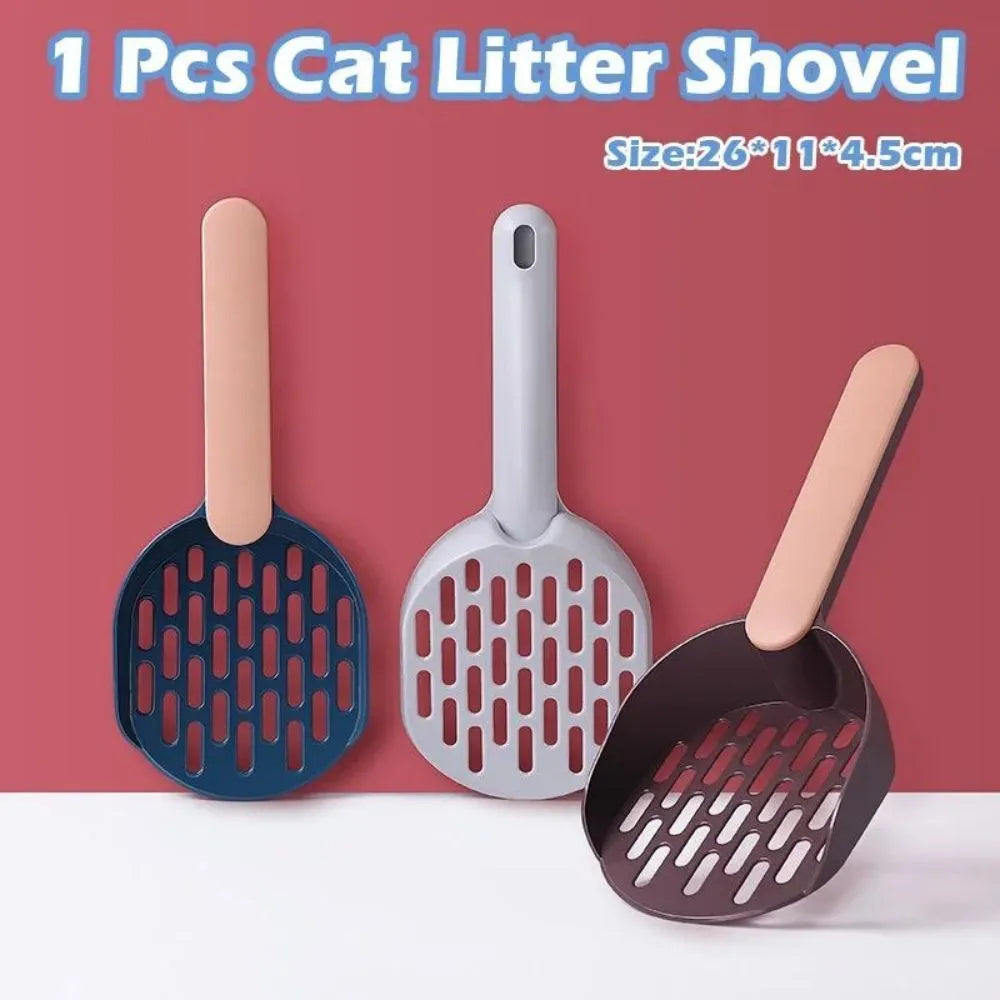Blue plastic cat litter shovel scoop tool for cleaning litter boxes.