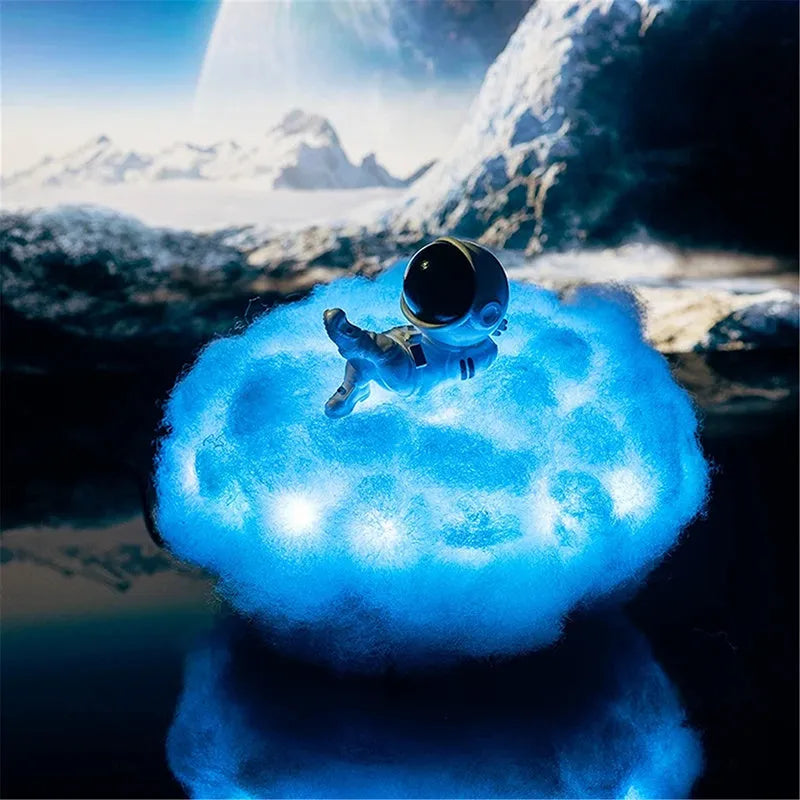 LED astronaut cloud lamp with colour-changing rainbow effect on a wooden stand, 15 x 20cm night light for kids