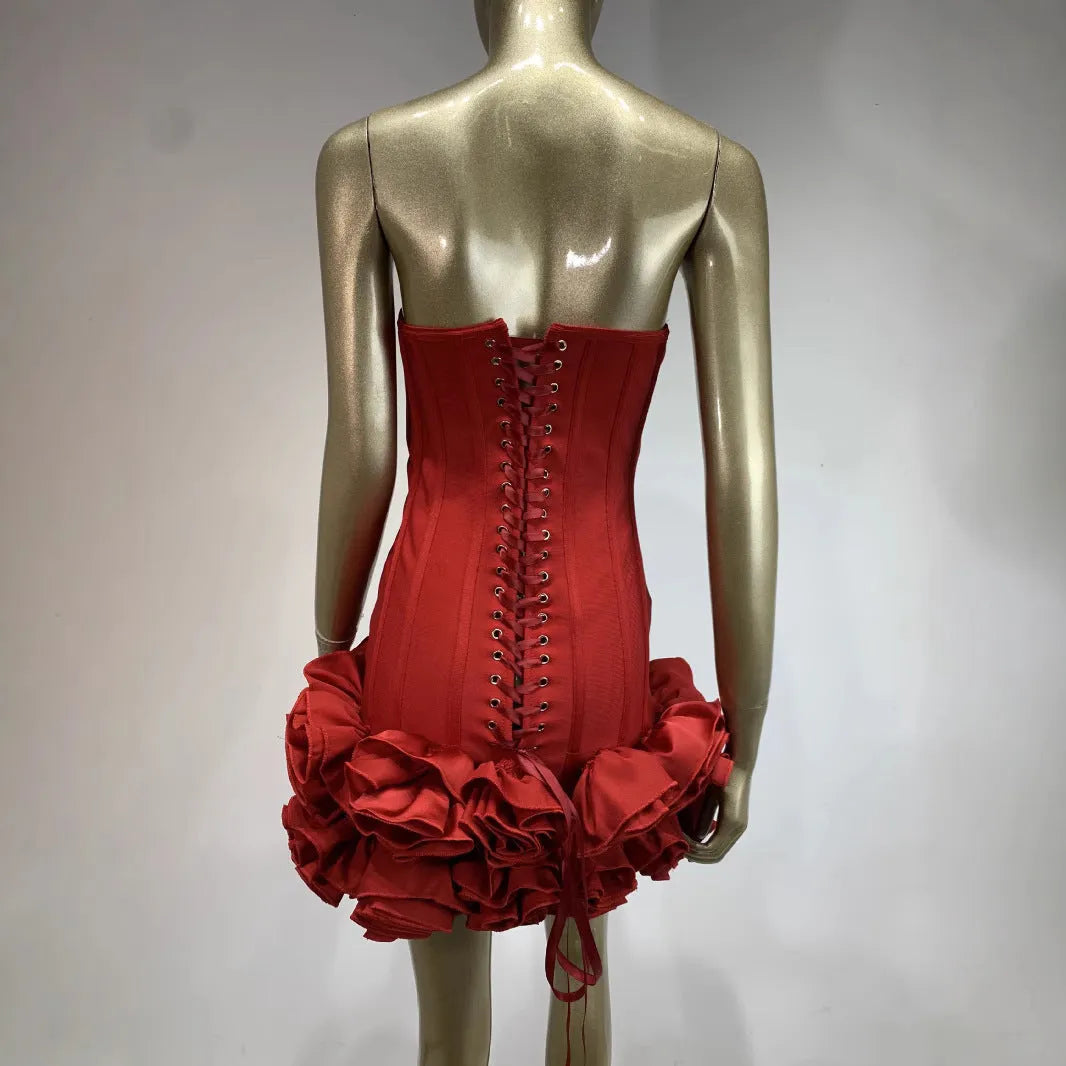 A women's solid colour polyester dress with a mid-waist in red, white, or black.