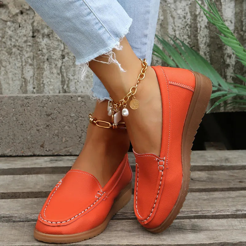 Women's PU leather loafers with car suture detailing, flat heel, available in UK sizes 35-42