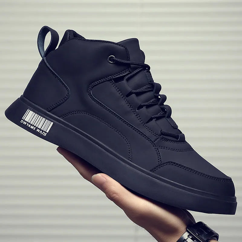 Men's white mid-top sports board shoes with low heel, round toe, and rubber sole on a casual background