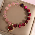 Strawberry crystal bracelet on elastic rope measuring 18cm length
