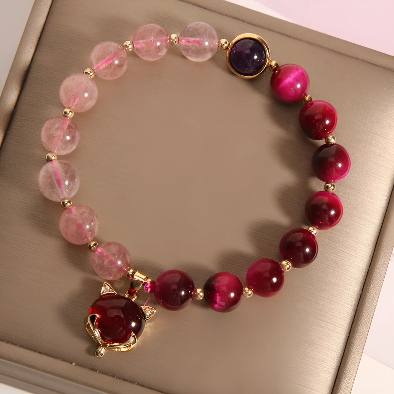 Strawberry crystal bracelet on elastic rope measuring 18cm length