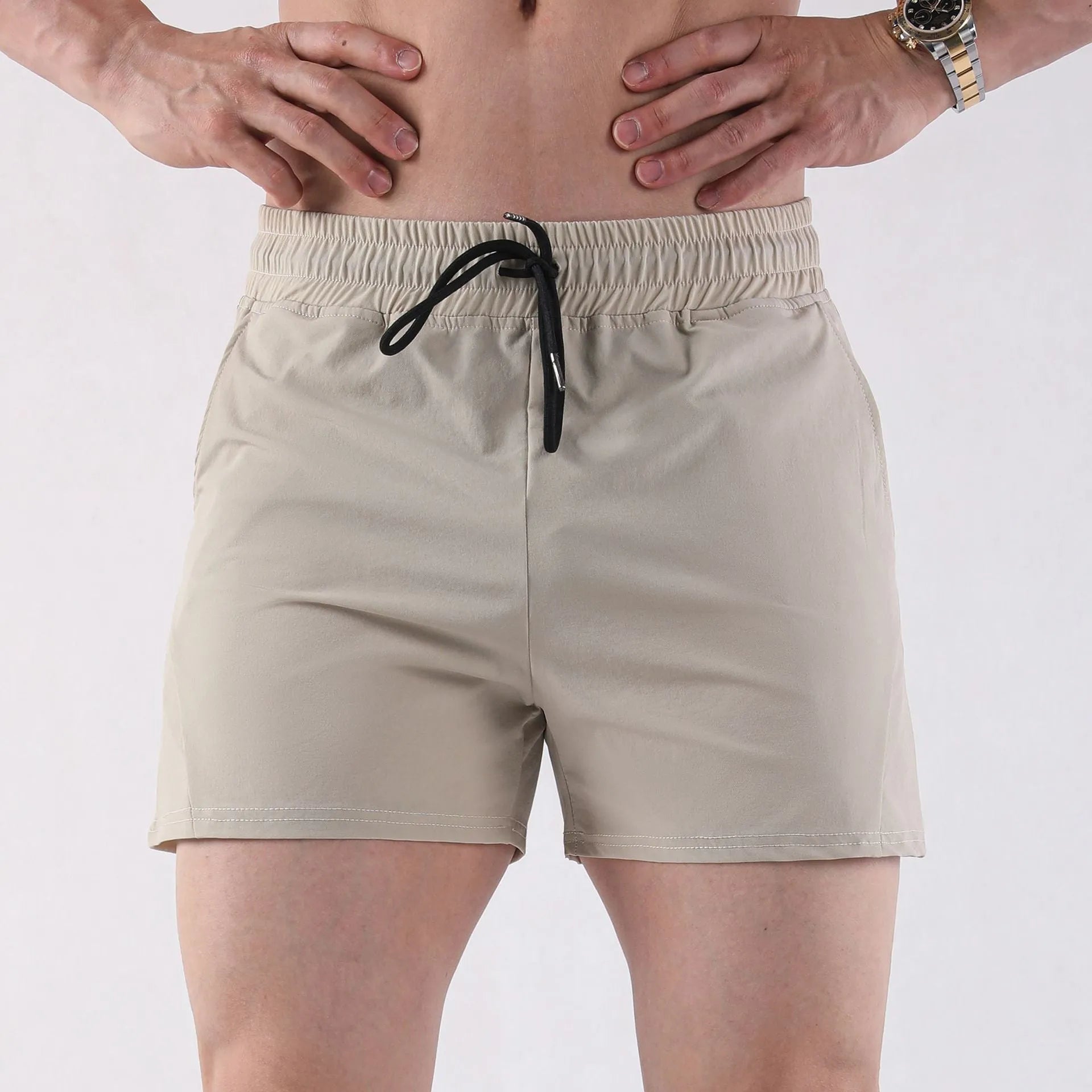 Men's basketball shorts in grey, black, apricot, or green, made from medium-elastic polyester for summer sports