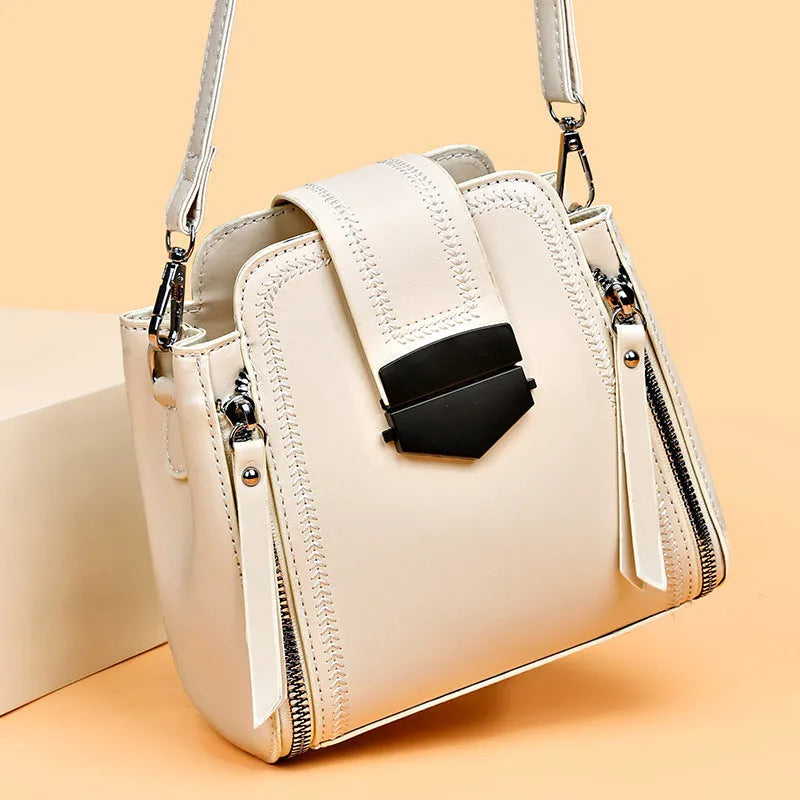 Small square handbag in soft textured PU leather with sewing thread details