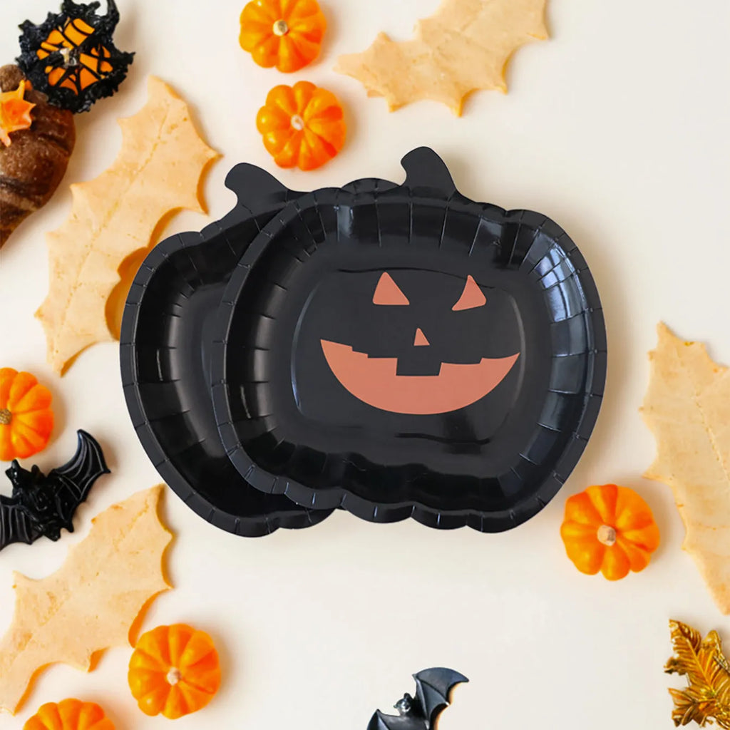 Black pumpkin design disposable paper plates for Halloween parties, 9-inch diameter