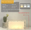 Geometric acrylic Ice Cube night lamp showing colour-changing illumination