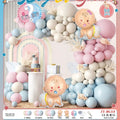 Gender reveal balloon decoration kit with pink and blue aluminium foil balloons, ribbon, and bottles.