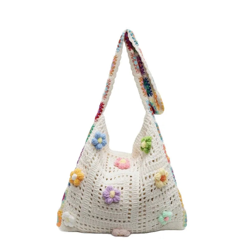 Casual hollow weave beach shoulder bag in milky white showing knitting texture