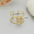 Adjustable opening copper ring with 14K gold plating and asymmetric U-shaped design