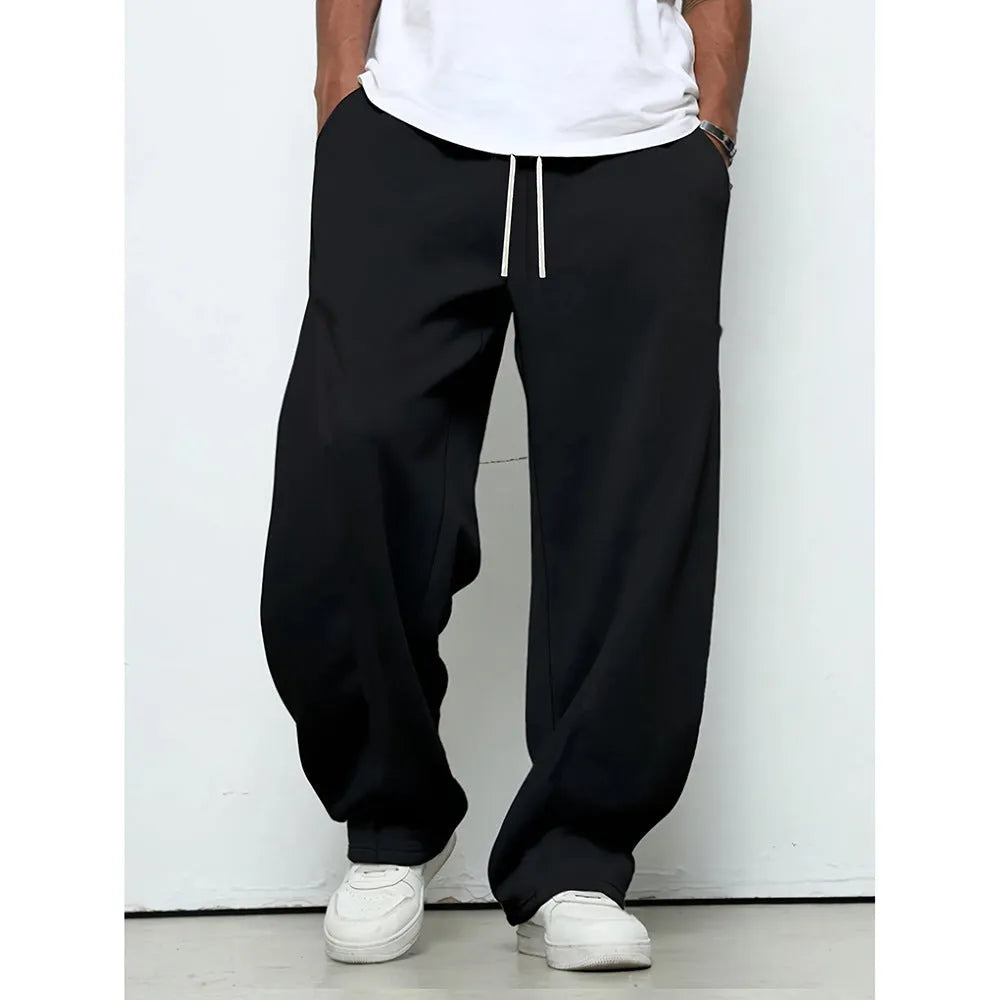 Men's straight leg casual trousers in polyester with micro-elastic waistband and drawstring closure, available in three colours.